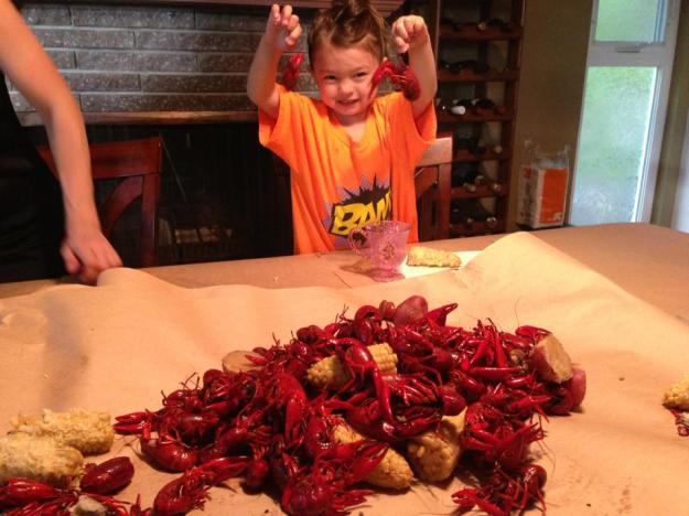 Little Miss Mimi and some of the crawfish we boiled up this weekend
